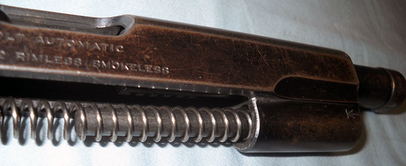 detail, Colt 1903 mainspring/slide reassembly